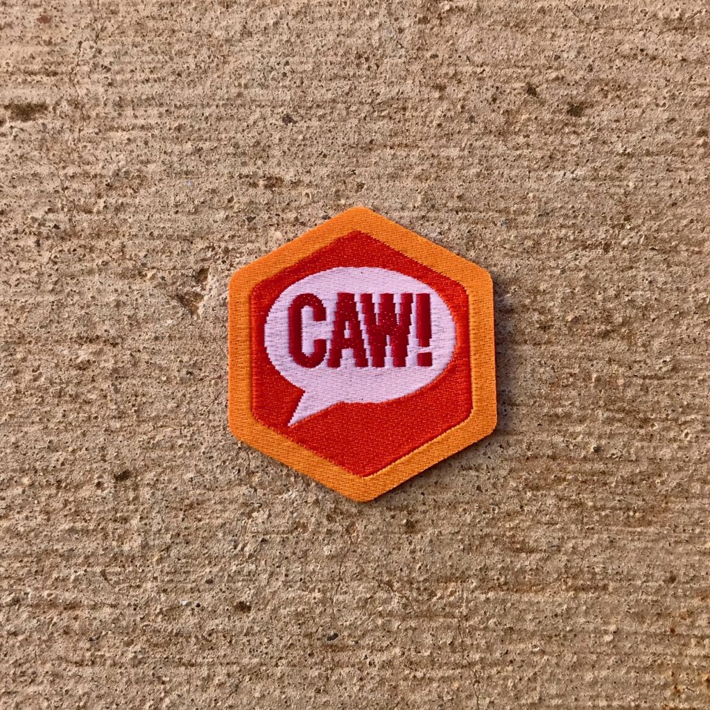 Caw Badge